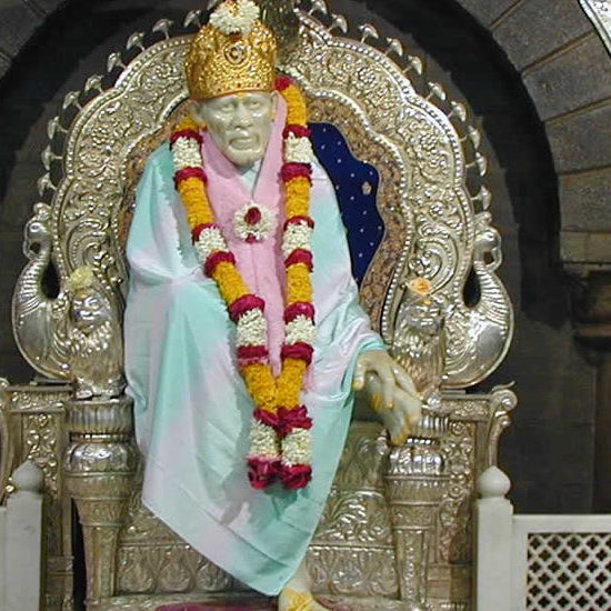 The symbolism and meaning behind different elements of the Sai Baba Marble Statue.