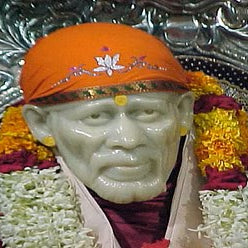 The impact of the Sai baba marble statue on the local community and on devotees of Sai Baba.